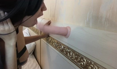 Kinky brunette pussycat sucks the fat dildo