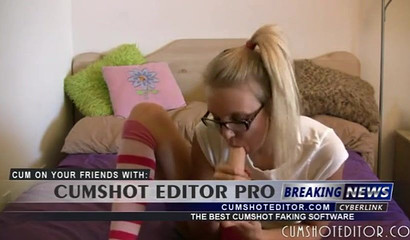 Pigtailed teen in sexy socks blowing a toy