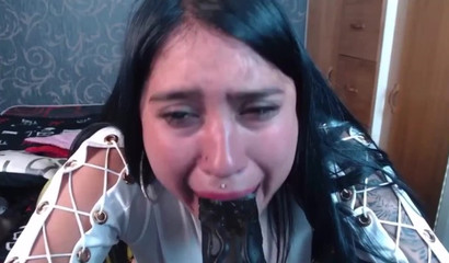 Latina girl on Chaturbate gives her toy a blowjob