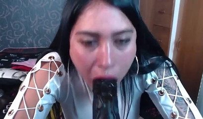 Latina girl on Chaturbate gives her toy a blowjob