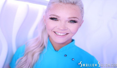 Kay Carter on her knees blowing a huge dick