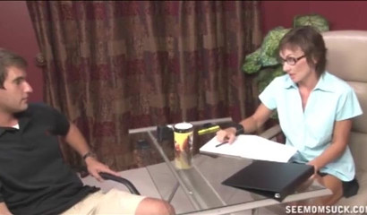 Mature slut feeds herself with a neighbor's dick