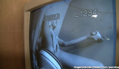 The blonde Riley Evans enjoys sucking cock at the gloryhole