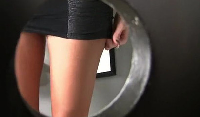 Horny blonde Darcy Tyler worships a boner at the gloryhole