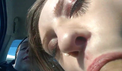 Amateur vixen plays with her big tits and gives a BJ in public