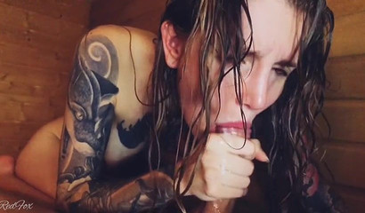 Inked Emo girl giving a footjob and blowjob in the sauna