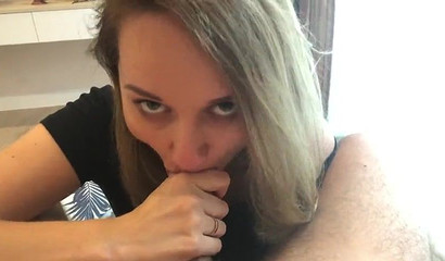 Naughty girlfriend makes an eye contact while giving head in POV