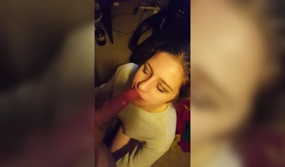 Amateur teen with a lip piercing sucking a lengthy cock
