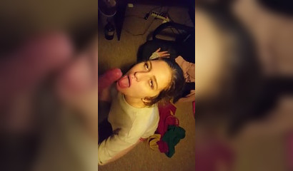 Amateur teen with a lip piercing sucking a lengthy cock