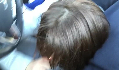 Cute brunette giving me head while driving on a highway