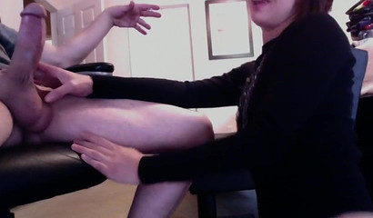 Slutty brunette cutie sucking off her man while he works