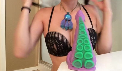 Kinky Brunette Teen Sucking Her Tentacle Shaped Dildo