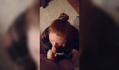 Redhead has a fat one to suck and swallow with desire