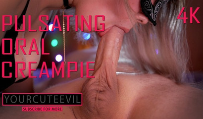 Beautiful Masked Blonde Sucking A Huge And Hard Cock On The Bed